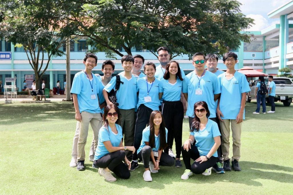 HOPE volunteers, many of them students, in matching blue shirts